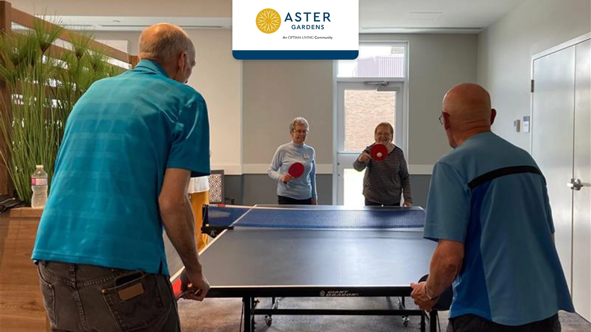 Some senior citizens playing table tennis